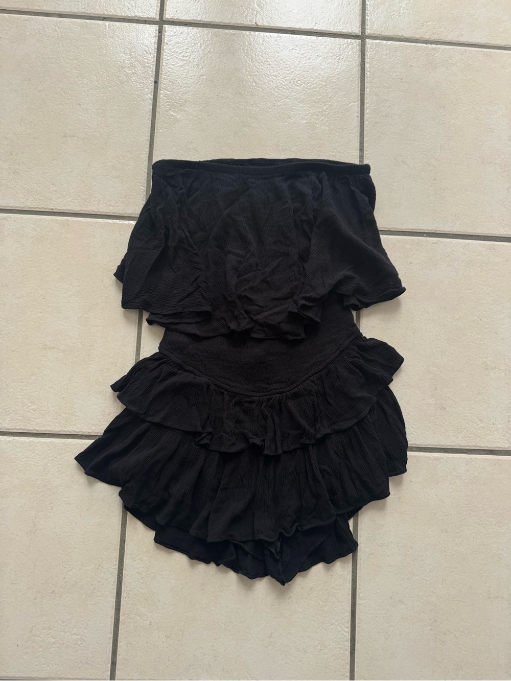 Black ruffle romper